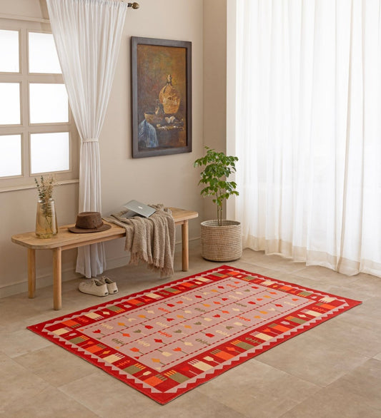 Coral Nomad Arrow rug - styled room view