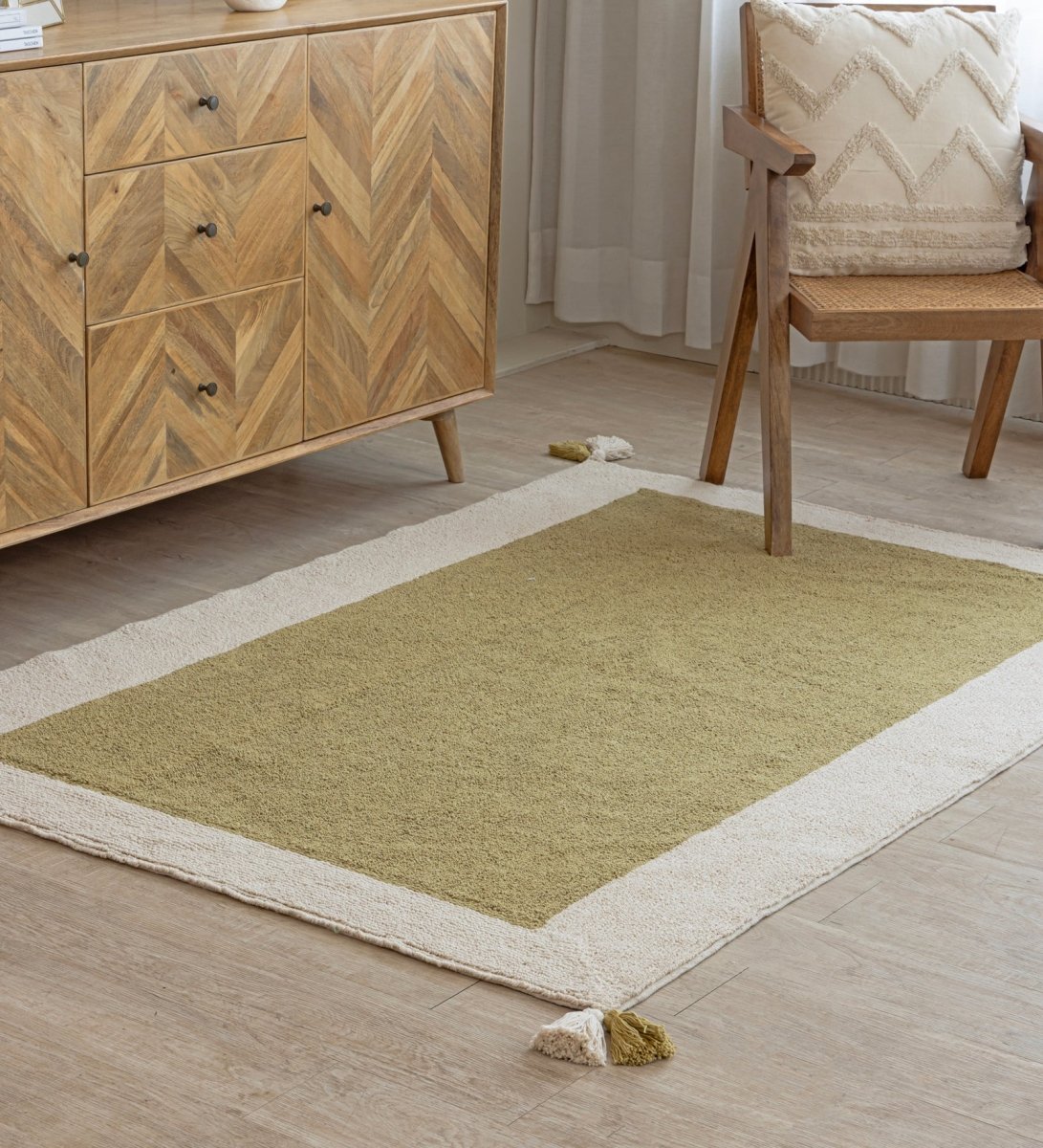 Sage Border Hand Tufted rug - styled room view